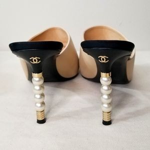 CHANEL Black and Cream Mules with Pearl Accents